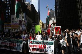 People march during a protest in New York, against Israeli military action in Gaza, August 9, 2014. Israel launched more than 30 air attacks in Gaza on Saturday, killing nine Palestinians, and militants fired rockets at Israel as the conflict entered a second month, defying international efforts to revive a ceasefire. REUTERS/Eduardo Munoz (UNITED STATES - Tags: CIVIL UNREST POLITICS CONFLICT)