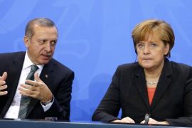 File photo of German Chancellor Angela Merkel and Turkey's Prime Minister Tayyip Erdogan addressing the media after talks in Berlin February 4, 2014. Germany's foreign intelligence agency has been spying on Turkey for nearly four decades, Focus magazine said August 23, 2014, in a report which could raise tensions further between the NATO allies. The magazine also cited government sources as saying the BND intelligence agency's current mandate to monitor Turkish political and state institutions had been agreed by a government working group. That included representatives of the chancellor's office, the defence, foreign and economy ministries. A spokesman for the German government declined to comment on the report. REUTERS/Tobias Schwarz/Files (GERMANY - Tags: POLITICS)