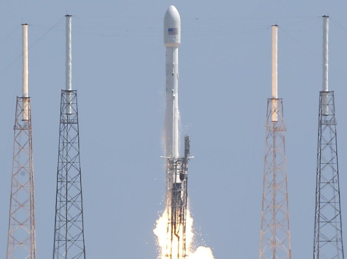 A SpaceX Falcon 9 rocket, carrying a payload of Orbcomm communications satellites, lifts off from launch complex 40 at the Cape Canaveral Air Force Station in Cape Canaveral, Fla., Monday, July 14, 2014. (AP Photo/John Raoux)