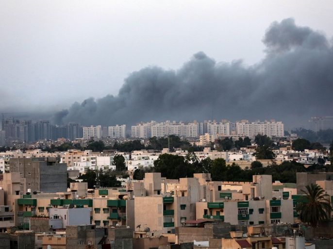 Smoke fills the sky over Tripoli after fighting between militias of 'Libya Fajr' (Dawn of Libya) and 'Karama' (Dignity) in Tripoli, Libya, 23 August 2014. Rrival militias have been fighting since mid-July in the capital, Tripoli, for control of the city's main airport. The violence in Tripoli and the eastern city of Benghazi has prompted several countries to evacuate their citizens, including diplomats, from Libya.