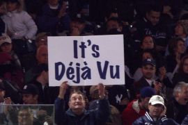 NEW YORK - OCTOBER 29: A fan of the New York Yankees holds up a sign which reads 'It's Deja Vu' in reference to Hall of Famer Yogi Berra against the Philadelphia Phillies in Game Two of the 2009 MLB World Series at Yankee Stadium on October 29, 2009 in the Bronx borough of New York City.