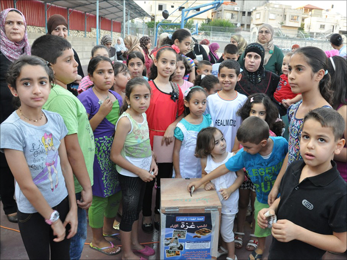 ‪حضور لافت لأطفال الداخل الفلسطيني في فعاليات التضامن مع غزة‬ (الجزيرة نت)