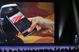 Apple CEO Tim Cook introduces the new Apple Pay product on Tuesday, Sept. 9, 2014, in Cupertino, Calif. (AP Photo/Marcio Jose Sanchez)