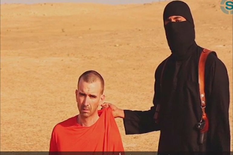 REUTERS IS UNABLE TO INDEPENDENTLY VERIFY THE AUTHENTICITY OF THIS VIDEO A video purportedly showing threats being made to a man Islamic State (IS) named as David Haines by a masked IS fighter in an unknown location in this still image from video released by Islamic State September 2, 2014. The masked figure in the video issued a threat against Haines, and warned governments to back off "this evil alliance of America against the Islamic State", the SITE monitoring service said. REUTERS/Islamic State via Reuters TV (Tags: CRIME LAW CIVIL UNREST)ATTENTION EDITORS - THIS PICTURE WAS PROVIDED BY A THIRD PARTY. REUTERS IS UNABLE TO INDEPENDENTLY VERIFY THE AUTHENTICITY, CONTENT, LOCATION OR DATE OF THIS IMAGE. NO SALES. NO ARCHIVES. FOR EDITORIAL USE ONLY. NOT FOR SALE FOR MARKETING OR ADVERTISING CAMPAIGNS. IT IS DISTRIBUTED, EXACTLY AS RECEIVED BY REUTERS, AS A SERVICE TO CLIENTS