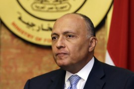 FILE - In this Friday, July 18, 2014, file photo, Egyptian Foreign Minister Sameh Shukri speaks during a news conference at the Egyptian Foreign Ministry in Cairo. Even as the death toll mounts in the Gaza Strip, attempts to broker a cease-fire between Hamas and Israel have so far run aground, in part because they have become mired in the deep schism between Mideast countries. Shukri said Egypt is in a "very tense and difficult" relationship with Hamas, where reaching common ground is nearly "impossible.” (AP Photo/Amr Nabil, File)