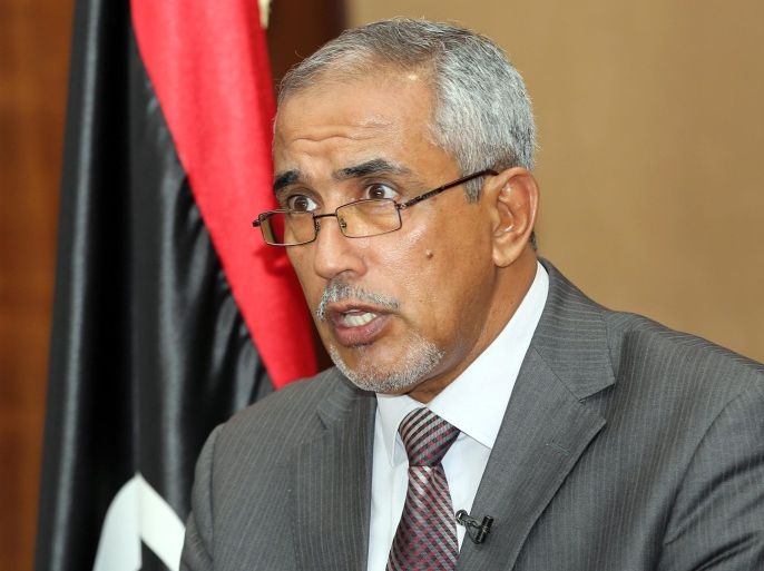 Leader of the Libyan 'national salvation government' Omar al-Hassi speaks during a televised address to the Libyan nation, in Tripoli, Libya, 30 August 2014. According to media reports on 29 August 2014, Libya's interim government resigned amid a deepening political crisis and deadly fighting among rival militias in the North African country. Al-Hassi has one week to form a government.