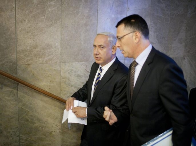 Israeli Prime Minister Benjamin Netanyahu (L) speaks to Israeli Education Minister Gideon Saar (R), as they arrive to the weekly Cabinet meeting at the government office in Jerusalem, Israel, 26 August 2012.