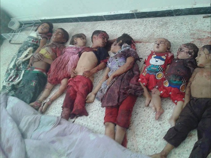 صورة المجزرة التي ارتكبتها ميليشيات الأسد في منطقة الشولا وأدت إلى مقتل 15 شخصاً بينهم 10 أطفال و5 نساء.