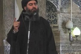 epa04382306 A frame from video released by the Islamic State (IS) purportedly shows the caliph of the self-proclaimed Islamic State, Abu Bakr al-Baghdadi, giving a speech in an unknown location. The Islamic State is believed to be responsible for the beheadings of American journalists James Foley and Steven Sotloff. The Islamic State originated as an al-Qaeda offshoot in Iraq. Composed of fundamentalist Sunni Muslims, the group targeted government and US forces after the ouster of Saddam Hussein in 2003. In 2012, it expanded into Syria when that country's uprising turned into a war between President Bashar al-Assad's government and rebel forces. In June, the militant group declared a caliphate under its current leader Abu Bakr al-Baghdadi. EPA