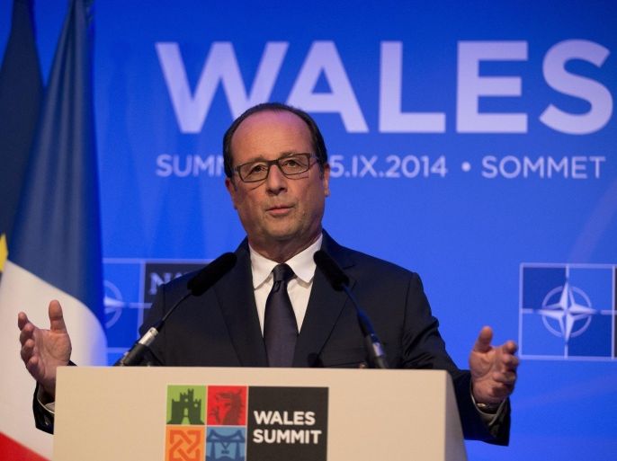 French President Francois Hollande speaks during a press conference at the end of the NATO summit at the Celtic Manor Resort in Newport, Wales, Friday, Sept. 5, 2014. (AP Photo/Matt Dunham)