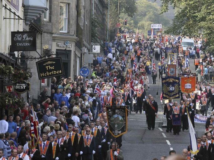 Members of the Orange Order march during a pro-Union rally in Edinburgh, Scotland September 13, 2014. About 12,000 Protestant loyalists from Northern Ireland and Scotland marched through central Edinburgh on Saturday in an emotional show of support for keeping Scotland in the United Kingdom. The referendum on Scottish independence will take place on September 18, when Scotland will vote whether or not to end the 307-year-old union with the rest of the United Kingdom. REUTERS/Paul Hackett (BRITAIN - Tags: POLITICS ELECTIONS)