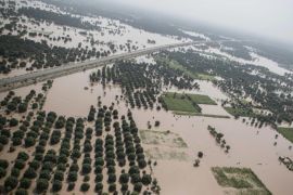 An aerial view taken from an Pakistani air force helicopter shows a flooded area in Multan, Punjab province, September 12, 2014. Floods that have killed 450 people in India and Pakistan began to recede on Wednesday giving rescue teams a chance to evacuate thousands of villagers stranded by the heaviest rainfall in 50 years in the heavily militarised and disputed region of Kashmir. REUTERS/Zohra Bensemra ( PAKISTAN - Tags: DISASTER ENVIRONMENT)