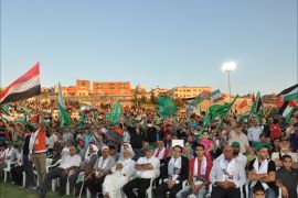 الحشود ترفع أعلام فلسطيني ودول الربيع العربي بمهرجان " الأقصى في خطر" التاسع عشر الذي أقيم بأم الفحم بالداخل الفلسطيني بـ 12 من شهر سبتمبر‎-أيلول.