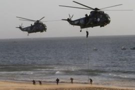 Commandos of Pakistan Navy land from helicopters during their Martitime Counter Terrorism exercise in Manora in Pakistan on Tuesday, March 8, 2011. The demonstration included fast maneuvers by hovercrafts and military assault boats.