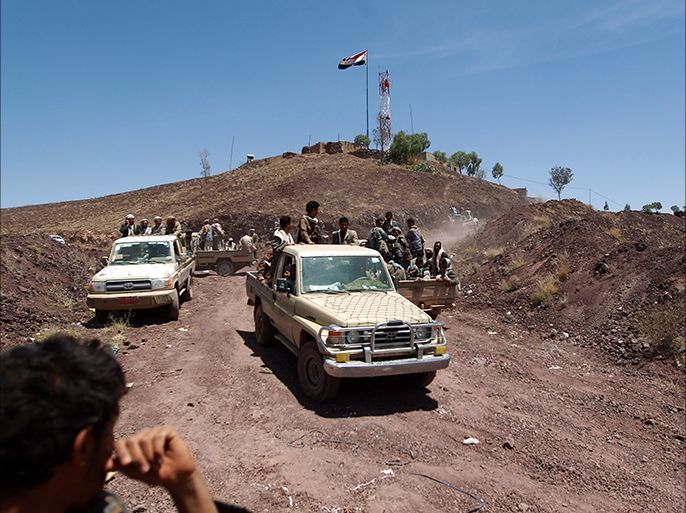 Yemeni Shiite Huthi anti-government rebels drive pickup trucks at an army base which they captured without resistance just hours before the signing a UN-brokered peace agreement on September 22, 2014 in the Yemeni capital, Sanaa. The hard-won deal, signed the day before by the president and all the main political parties, is intended to end a week of deadly fighting in Sanaa between the rebels and their opponents, and put the country's troubled transition back on track. AFP