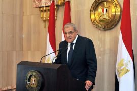 A handout photo made available by the Egyptian Presidency shows Prime Minister Ibrahim Mehleb speaking during a press conference after the government was sworn-in, Cairo, Egypt, 17 June 2014. Egypt's first government under recently elected President Abdel-Fattah al-Sissi took office in an early morning ceremony on 17 June 2014. Prime Minister Ibrahim Mehleb retained his position as did 20 members of the outgoing cabinet that served under interim president Adli Mansour. EPA/EGYPTIAN PRESIDENCY/HANDOUT