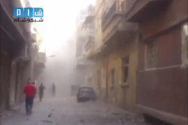 اشتباكات بعد تفجير مبانٍ بمخيم اليرموك في دمشق