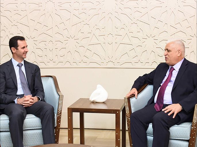 Syria's President Bashar al-Assad (L) meets Faleh al-Fayad, the Iraqi National Security Advisor and envoy of the Iraqi Prime Minister Haider al-Abadi, in Damascus September 16, 2014,in this picture released by Syria's national news agency SANA. Iraq's national security adviser briefed al-Assad on efforts to counter Islamic State on Tuesday, Syrian state media reported, the first such meeting since the United States launched air strikes on the radical group in Iraq. REUTERS/SANA/Handout via Reuters (SYRIA - Tags: POLITICS CONFLICT CIVIL UNREST) ATTENTION EDITORS - THIS PICTURE WAS PROVIDED BY A THIRD PARTY. REUTERS IS UNABLE TO INDEPENDENTLY VERIFY THE AUTHENTICITY, CONTENT, LOCATION OR DATE OF THIS IMAGE. FOR EDITORIAL USE ONLY. NOT FOR SALE FOR MARKETING OR ADVERTISING CAMPAIGNS. THIS PICTURE IS DISTRIBUTED EXACTLY AS RECEIVED BY REUTERS, AS A SERVICE TO CLIENTS