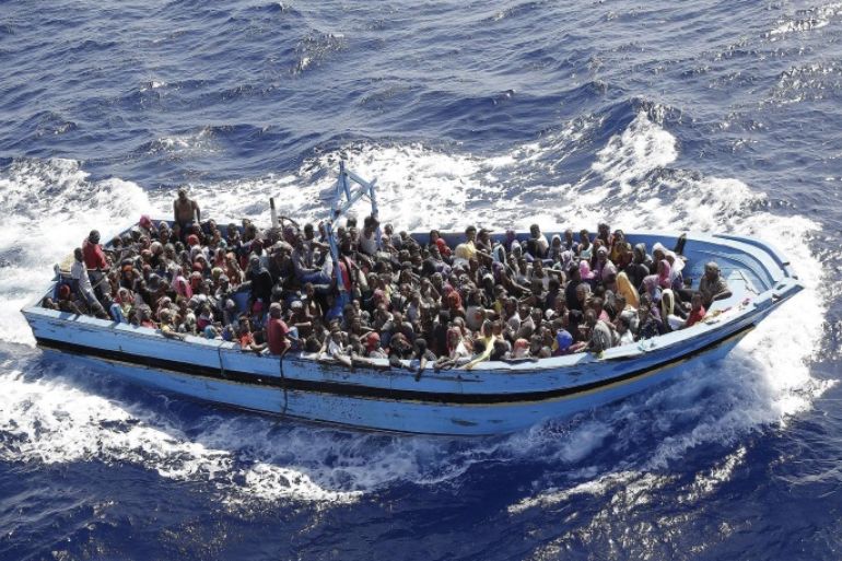 More than 900 illegal migrants are shipped to the mainland after being rescued by Italian Navy boat 'Fregata Euro' in the Mediterranean Sea, 12 September 2014.
