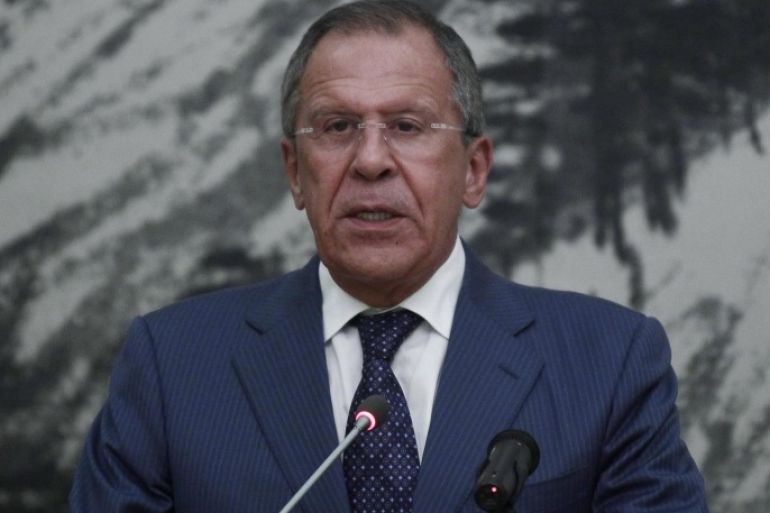 Russia's Foreign Minister Sergei Lavrov addresses a news conference during his visit to African Union headquarters in Ethiopia's capital Addis Ababa, September 17, 2014. Lavrov said the ceasefire in Ukraine was holding and that violations were likely to decrease in number, RIA news agency reported on Wednesday. REUTERS/Tiksa Negeri (ETHIOPIA - Tags: SOCIETY POLITICS)