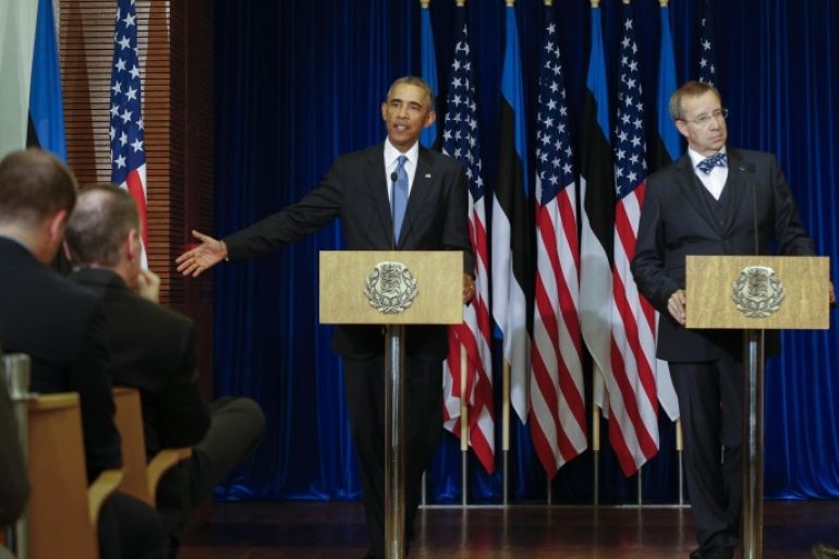U.S. President Barack Obama, left, speaks as Estonian President Toomas Hendrik listens to him during a news conference at the Bank of Estonia in Tallinn, Estonia, Wednesday, Sept. 3, 2014. Wednesday's statement came as U.S. President Barack Obama arrived in Estonia in a show of solidarity with NATO allies who fear they could be the next target of Russia's aggression. (AP Photo/Mindaugas Kulbis)