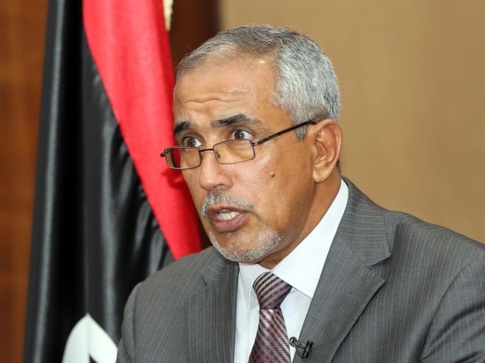 Leader of the Libyan 'national salvation government' Omar al-Hassi speaks during a televised address to the Libyan nation, in Tripoli, Libya, 30 August 2014. According to media reports on 29 August 2014, Libya's interim government resigned amid a deepening political crisis and deadly fighting among rival militias in the North African country. Al-Hassi has one week to form a government.