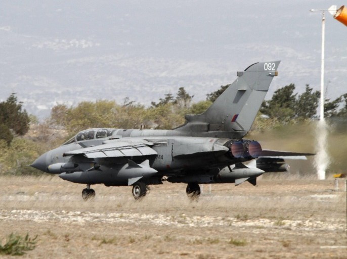 A British Tornado jet prepares to takeoff at the RAF Akrotiri in Cyprus September 27, 2014. Britain's parliament approved air strikes against Islamic State (IS) insurgents in Iraq by a decisive margin on Friday, paving the way for the Royal Air Force to join U.S.-led military action with immediate effect. Six Cyprus-based Tornado GR4 fighter-bombers were on standby to take part in initial sorties after Prime Minister David Cameron recalled parliament from recess to back military action following a formal request from the Iraqi government. REUTERS/Stringer (CYPRUS - Tags: POLITICS TRANSPORT CIVIL UNREST MILITARY)