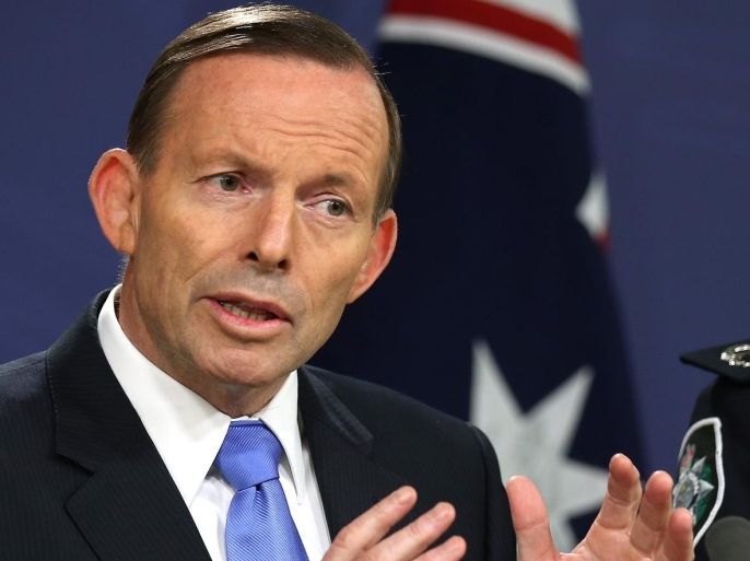 Australian Prime Minister Tony Abbott briefs media, in Sydney, Friday, Sept. 19, 2014, after police said they thwarted a plot to carry out beheadings in Australia by Islamic State group supporters when they raided more than a dozen properties across Sydney on Thursday. Abbott conceded it was difficult to safeguard the Australian population against such attacks. (AP Photo/Rick Rycroft)