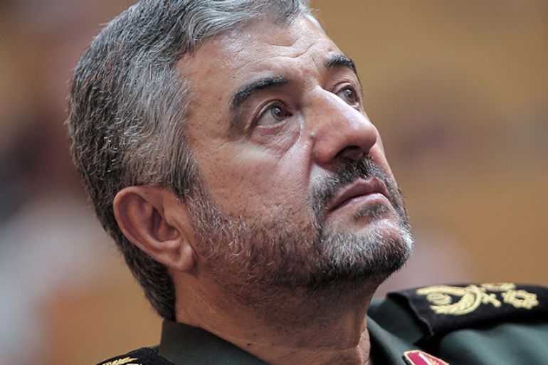 الموسوعة - Iran's Revolutionary Guards commander General Mohammad Ali Jafari looks up during a ceremony to commemorate the Martyrs' of Terrorism in Tehran on September 6, 2011.