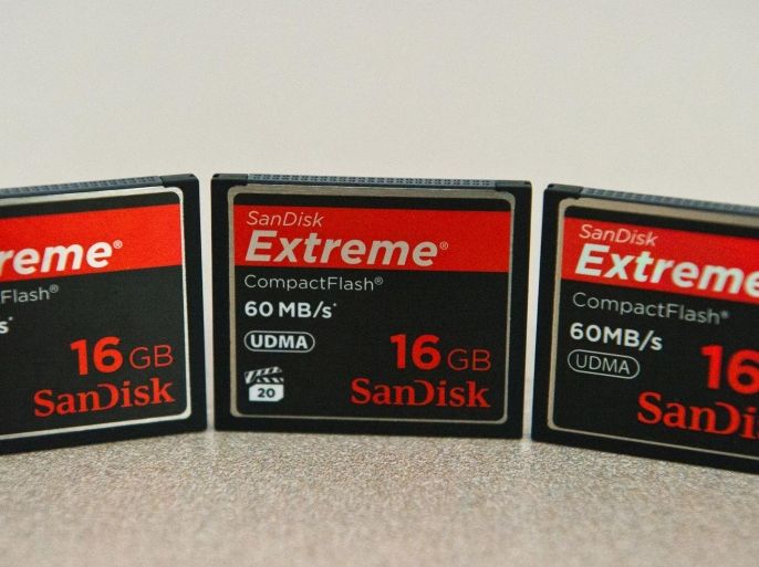 This June 16, 2014 photo taken in Washington, DC shows SanDisk Extreme CompactFlash cards. US computer storage company SanDisk said Monday it was buying flash memory firm Fusion-io for $1.6 billion.The deal will help SanDisk, a maker of memory cards used for computers, smartphones and other devices, to boost its flash memory capacity with the acquisition of Fusion-io, which provides a wide array of products and services for businesses.Fusion-io was founded in 2006, by Apple co-founder Steve Wozniak and others, to help provide solutions for the growing amounts of data that was overloading storage systems. AFP PHOTO / Karen BLEIER