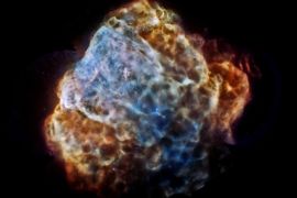 A handout photo made available on the website of the National Aeronautics and Space Administration (NASA) on 10 September 2014 of what they describe as a powerful supernova explosion with its destructive results revealing themselves in a delicate tapestry of X-ray light, seen in the image from NASAâs Chandra X-Ray Observatory and the European Space Agency's XMM-Newton. The image shows the remains of a supernova that would have been witnessed on Earth about 3,700 years ago. The remnant is called Puppis A, and is around 7,000 light years away and about 10 light years across, NASA says. This image provides the most complete and detailed X-ray view of Puppis A ever obtained, made by combining a mosaic of different Chandra and XMM-Newton observations. Low-energy X-rays are shown in red, medium-energy X-rays are in green and high energy X-rays are colored blue. EPA/NASA/CXC/IAFEESA/XMM-Newton / HANDOUT