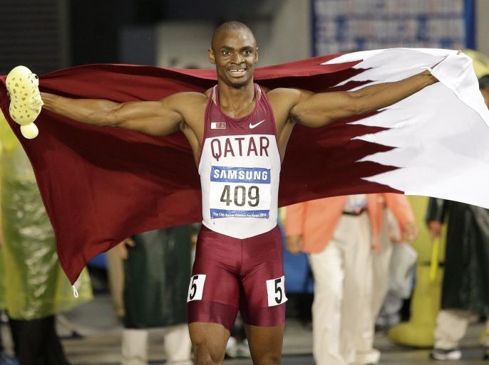 Qatar's Femi Ogunode celebrates after winning the men's 100 meters final at the 17th Asian Games in Incheon, South Korea, Sunday, Sept. 28, 2014. (AP Photo/Lee Jin-man)