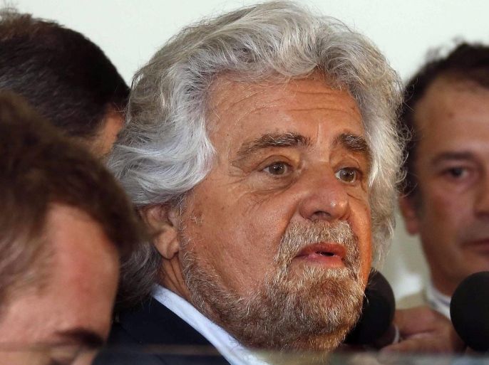 Beppe Grillo (C), leader of Five Star Movement (M5s) party arrives at the investors assembly of Monte dei Paschi di Siena bank in Siena, Italy, 29 April 2014. Grillo participated in the assembly.