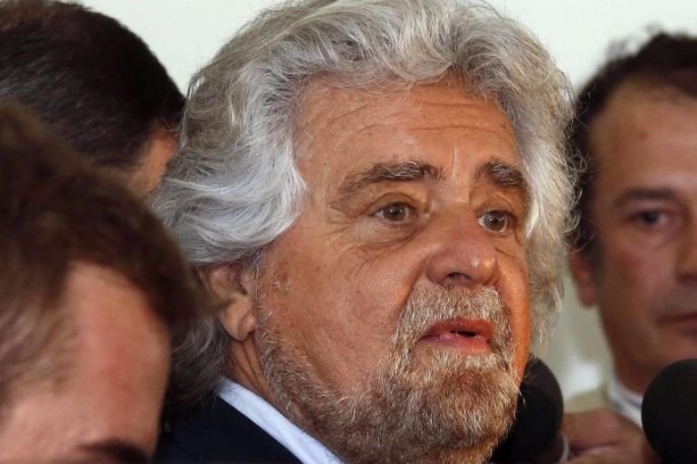 Beppe Grillo (C), leader of Five Star Movement (M5s) party arrives at the investors assembly of Monte dei Paschi di Siena bank in Siena, Italy, 29 April 2014. Grillo participated in the assembly.