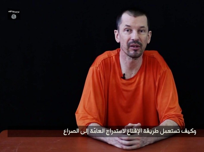 An undated handout video grab provided by the Islamic State via IntelCenter on 23 September 2014 shows British hostage John Cantlie held by Islamic State militants at an undisclosed location. A second video purportedly of British hostage John Cantlie was released by the Islamic State as the United States and Arab allies hit the extremist group's targets inside Syria for the first time. Journalist John Cantlie has been held hostage for almost two years. In the video, entitled Lend Me Your Ears: Message from the British Detainee John Cantlie: Episode 1, he is critical of the military campaign against the militant group. EPA/ISLAMIC STATE VIDEO/HANDOUT