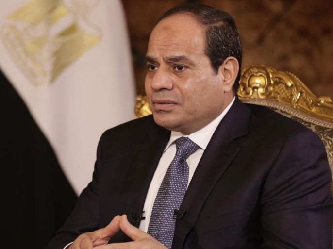 Egyptian President Abdel-Fattah el-Sissi speaks during an interview with The Associated Press at the presidential palace in Cairo, Saturday, Sept. 20, 2014. In his first interview with foreign media since taking office in June, el-Sissi has told AP he is prepared to give whatever support is needed in the fight against the Islamic State group but says military action is not the only answer. (AP Photo/Maya Alleruzzo)