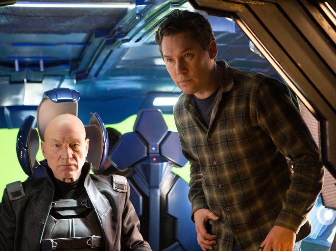 This image released by 20th Century Fox shows director Bryan Singer, right, with actor Patrick Stewart on the set of "X-Men: Days of Future Past." (AP Photo/20th Century Fox, Alan Markfield)