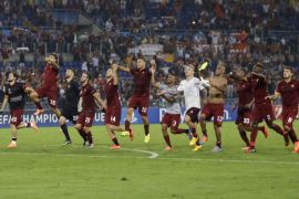 Roma players celebrate their 5-1 win at the end of a Champions League, Group E soccer match between Roma and CSKA, at the Olympic stadium, in Rome, Wednesday, Sept. 17, 2014. (AP Photo/Alessandra Tarantino)