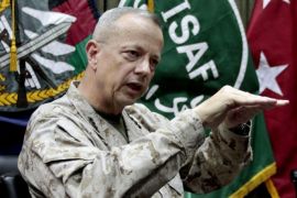 FILE - In this July 22, 2012 file photo, Gen. John Allen gestures during an interview with the Associated Press in Kabul, Afghanistan. US officials say that Allen will serve as coordinator for the broad international effort to battle the Islamic State group, as nations begin to determine what part each will play. Several US officials say Allen will coordinate the contributions that various nations make, as nearly 40 countries around the world agree to join the fight. Allen comes to the job with vast experience coordinating international allies on the warfront. He served as deputy commander in Iraq’s Anbar province in 2006-2008, working with Arab partners on organizing the Sunni uprising against al-Qaida. (AP Photo/Musadeq Sadeq, File)