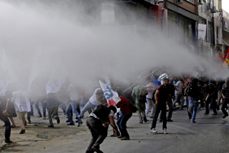 Turkish riot police use water cannon to disperse protesters during a demonstration after an elevator accident near a construction site in Istanbul, Turkey, 07 September 2014. At least 10 workers were killed during the construction of a 36-storey building in Istanbul when the elevator plummeted from one of the top floors, local media reported on 06 September. Istanbul, the largest city in Turkey, is experiencing a construction boom.