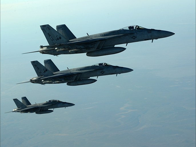 epa04416226 A handout picture made available by the US Department of Defense (DoD) on 25 September 2014 shows a formation of US Navy F-18E Super Hornets leaving after receiving fuel from a KC-135 Stratotanker over northern Iraq, 23 September 2014. These aircraft were part of a large coalition strike package that was the first to strike Islamic State (IS or ISIL) targets in Syria. Airstrikes carried out on late 24 September 2014 against Islamic State targets in Syria hit oil refineries that the US says provide a revenue stream for the militants, the Pentagon says. The oil refineries provide about 2 million US dollar a day in revenue for the Islamic State, Rear Admiral John Kirby says. Kirby spoke after the raids ended and all aircraft returned safely. The United States was joined by Saudi Arabia and the United Arab Emirites in carrying out the strikes, Kirby says. EPA/DOD/US AIR FORCE/SGT. SHAWN NICKEL HANDOUT EDITORIAL USE ONLY