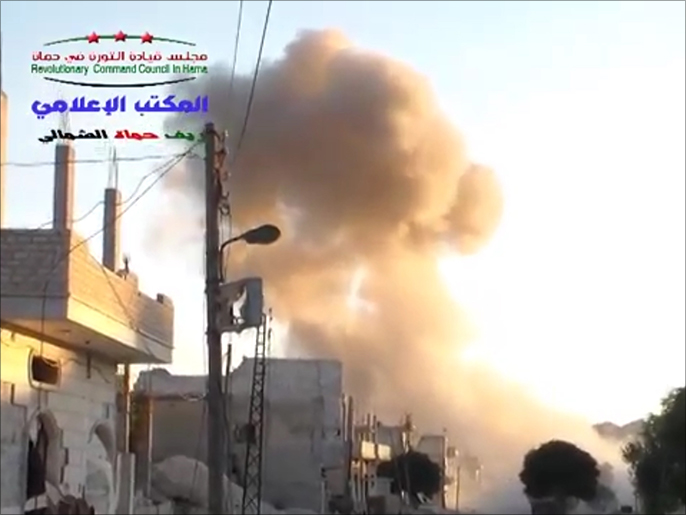 ‪قصف الطيران الحربي والمروحي لمدينة اللطامنة بريف حماة‬ (ناشطون)