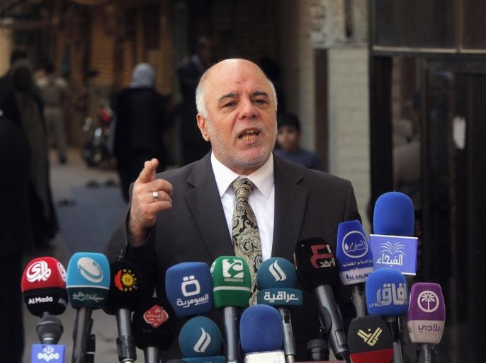 Iraqi Prime Minister Haider al-Abadi speaks at a news conference during his visit to Najaf, south of Baghdad, October 20, 2014. REUTERS/Alaa Al-Marjani (IRAQ - Tags: CIVIL UNREST MILITARY POLITICS CONFLICT)