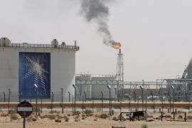 A gas flame is seen in the desert near the Khurais oilfield, about 160 km (99 miles) from Riyadh, in this June 23, 2008 file photo. A combination of massive currency reserves and a 2013 spending plan based on a conservative oil price projection means Saudi Arabia has considerable flexibility in deciding its oil output policy this year. To story SAUDI-OIL/BUDGET REUTERS/Ali Jarekji/Files (SAUDI ARABIA - Tags: BUSINESS ENERGY)