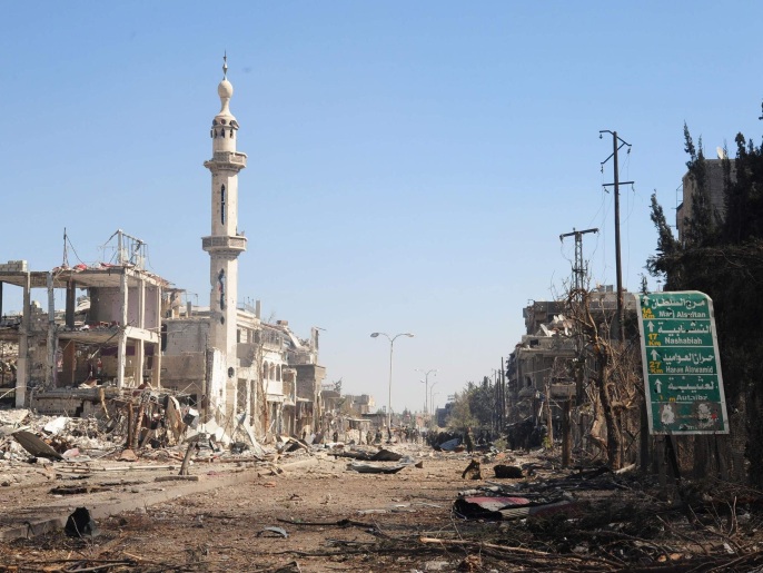 قوات النظام دخلت بلدة الدخانية وسيطرت عليها بعد انسحاب مقاتلي المعارضة (رويترز)