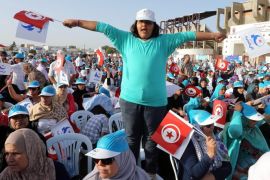 Supporter of Rachid Ghannouchi, leader of the Islamist Ennahda party, attend his electoral campaign in Jandouba, south west of Tunis,Tunisia 17 October 2014. Tunisians are preparing to to elect a new Parliament, on 26 October 2014, in an election which sees 13,000 candidates vying for the 217 seats of the National Assembly.