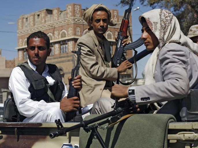 Houthi Shiite rebels ride in a military truck while patrolling a street in Sanaa, Yemen, Monday, Oct. 27, 2014. Fighting in Yemen's central Bayda province between Shiite Houthi rebels and the influential Qifa tribe in the town of Radda, some 200 kilometers (125 miles) south of the capital, Sanaa, killed at least 250 people over three days of clashes, security officials said Monday. Fighters from the Qifa tribe forced the Houthis out of the Manasih area in Radda, said the officials. A peace agreement signed between the Houthis and the government so far has failed to end the fighting. (AP Photo/Hani Mohammed)