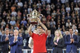 BASEL, SWITZERLAND - OCTOBER 26: Roger Federer of Switzerland celebrates his victory after the Swiss Indoors ATP 500 tennis tournament final match against David Goffin of Belgium at St Jakobshalle on October 26, 2014 in Basel, Switzerland.
