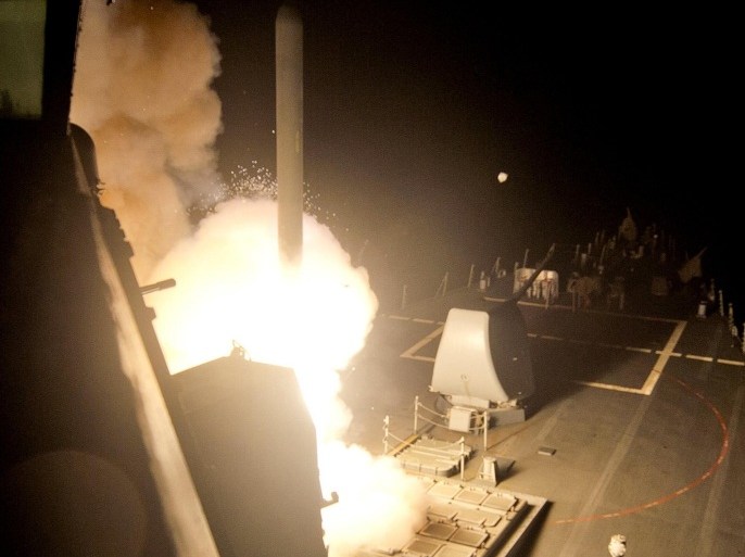 A Tomahawk cruise missile is launched against ISIL targets from the US Navy guided-missile destroyer USS Arleigh Burke, in the Red Sea September 23, 2014. The United States and Arab allies hit Islamic State (IS) targets including training camps, headquarters and weapon supplies in northern and eastern Syria in dozens of air and missile strikes on Tuesday, the U.S. military and a monitoring group said. REUTERS/U.S. Navy/Mass Communication Specialist 2nd Class Carlos M. Vazquez Ii/handout via Reuters (MID-SEA - Tags: MILITARY CIVIL UNREST POLITICS) FOR EDITORIAL USE ONLY. NOT FOR SALE FOR MARKETING OR ADVERTISING CAMPAIGNS. THIS IMAGE HAS BEEN SUPPLIED BY A THIRD PARTY. IT WAS PROCESSED BY REUTERS TO ENHANCE QUALITY. AN UNPROCESSED VERSION WAS PROVIDED SEPARATELY