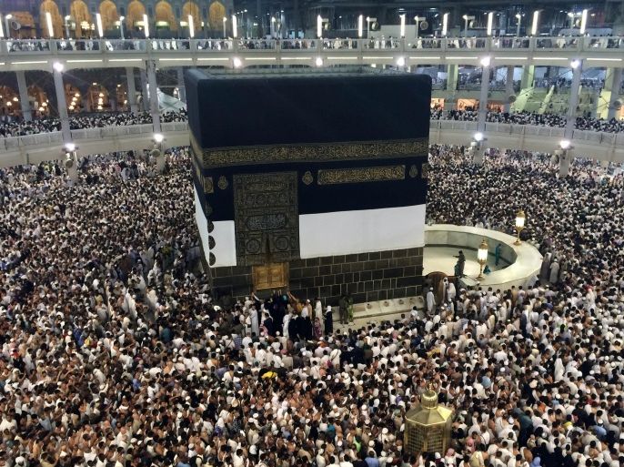 Muslim pilgrims moving around the Kaaba, the black cube at center, inside the Grand Mosque, a day before Muslim's annual pilgrimage, known as the Hajj, in the Muslim holy city of Mecca, Saudi Arabia, Wednesday, Oct. 1, 2014. (AP Photo/Khalid Mohammed)